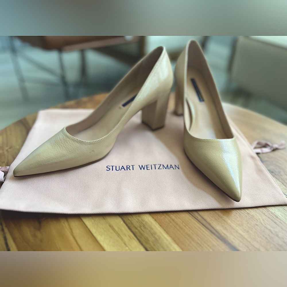 Stuart Weitzman nude block heels with textured material.